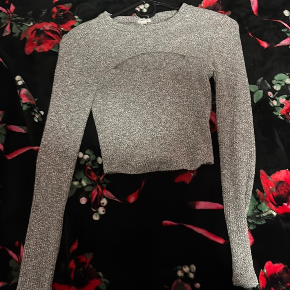 A gray opened cut top.